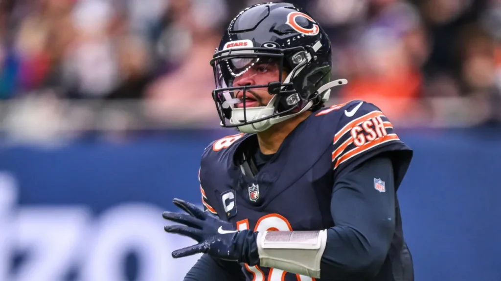 Caleb Williams of the Chicago Bears looks down field during the Week 6 match Chicago Bears vs Jacksonville Jaguars at Tottenham Hotspur Stadium London United Kingdom 13th October 2024
