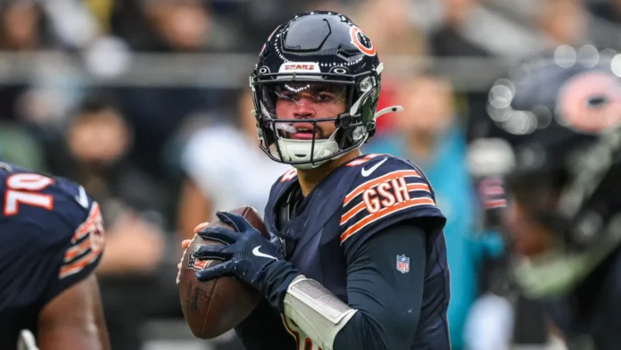 Caleb Williams of the Chicago Bears looks for a receiver down field during the Week 6 match Chicago Bears vs Jacksonville Jaguars at Tottenham Hotspur Stadium, London, United Kingdom.