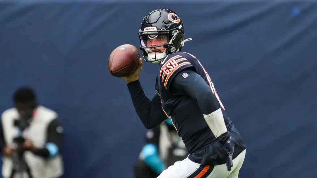 Caleb Williams of the Chicago Bears scrambles out of the pocket during the game