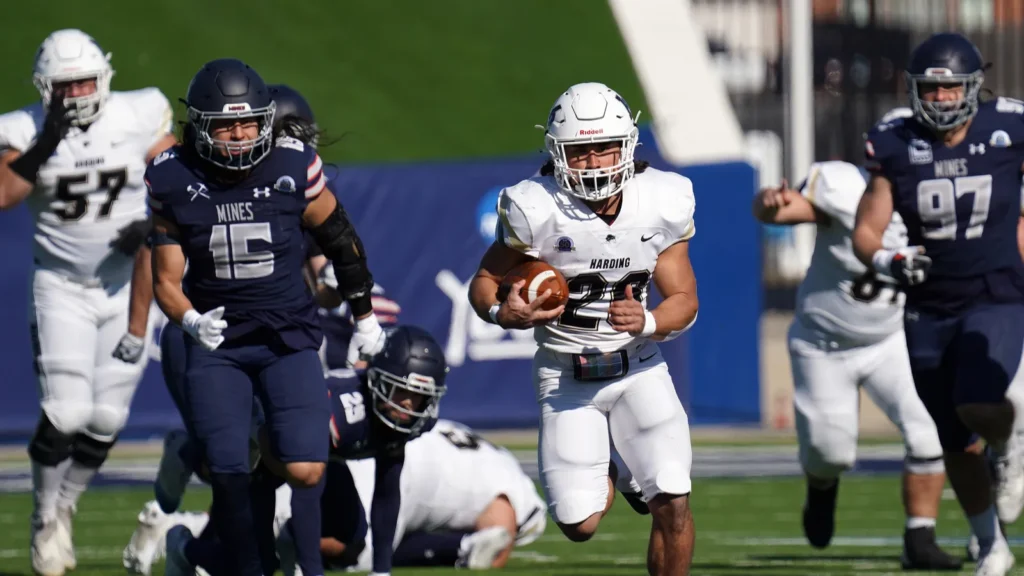 Football payers in action during the the 2023 NCAA Division II football championship game. 