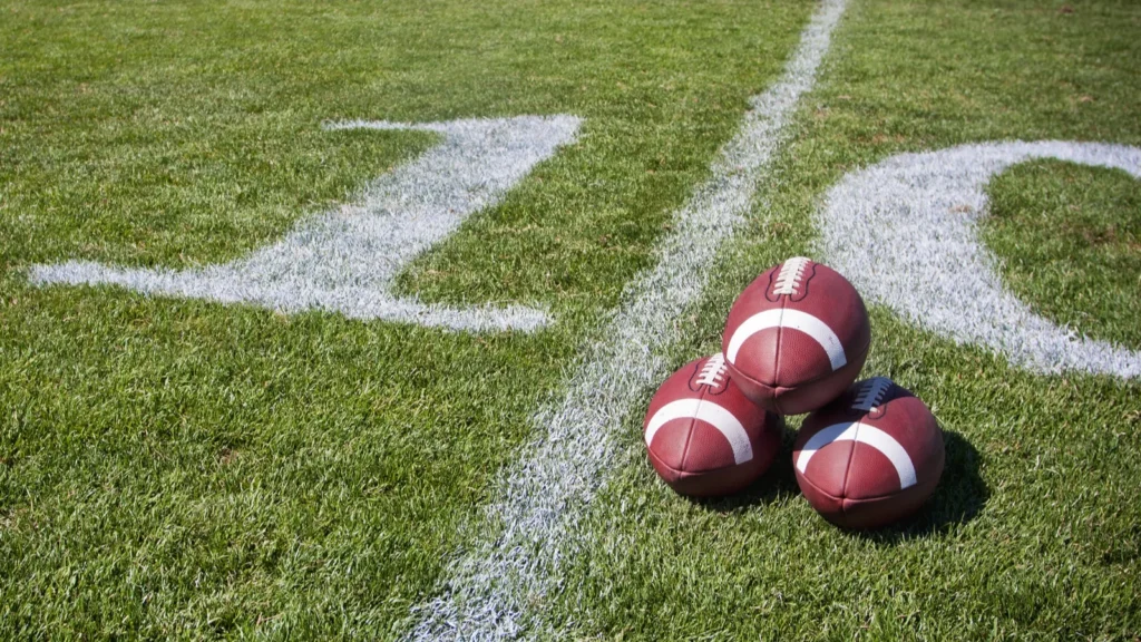 Footballs positioned together