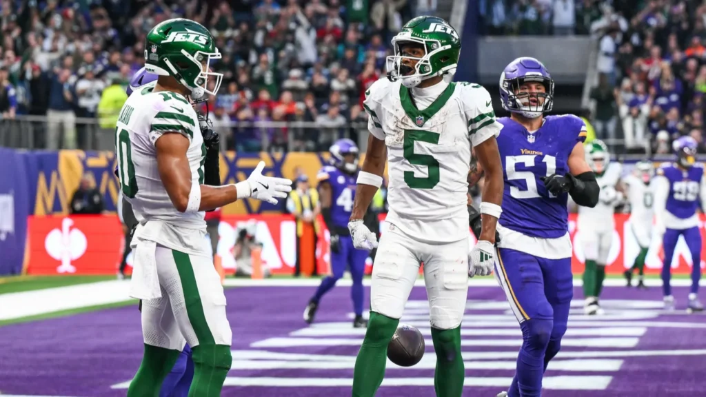 Garrett Wilson of the New York Jets celebrates his touchdown during the Week 5 match New York Jets vs Minnesota Vikings at Tottenham Hotspur Stadium London United Kingdom 6th October 2024