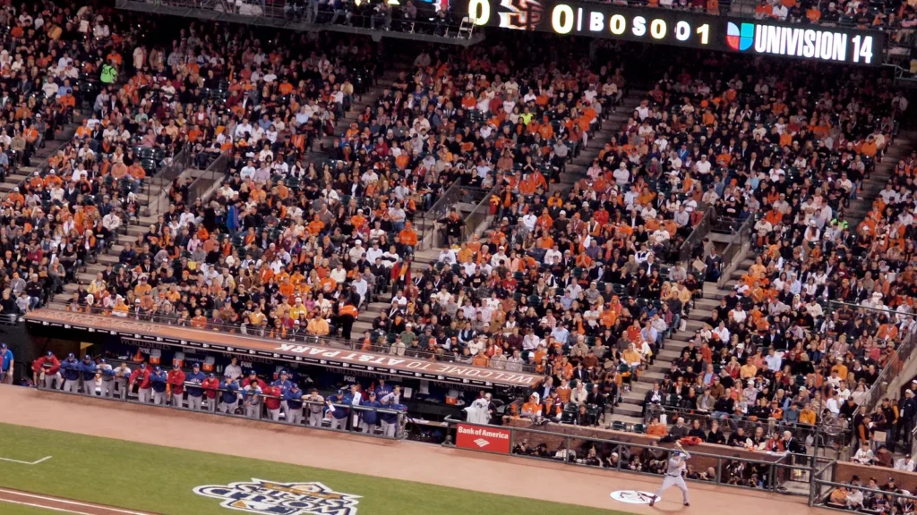 Giants Matt Cain steps forward to throws pitch to Rangers batter