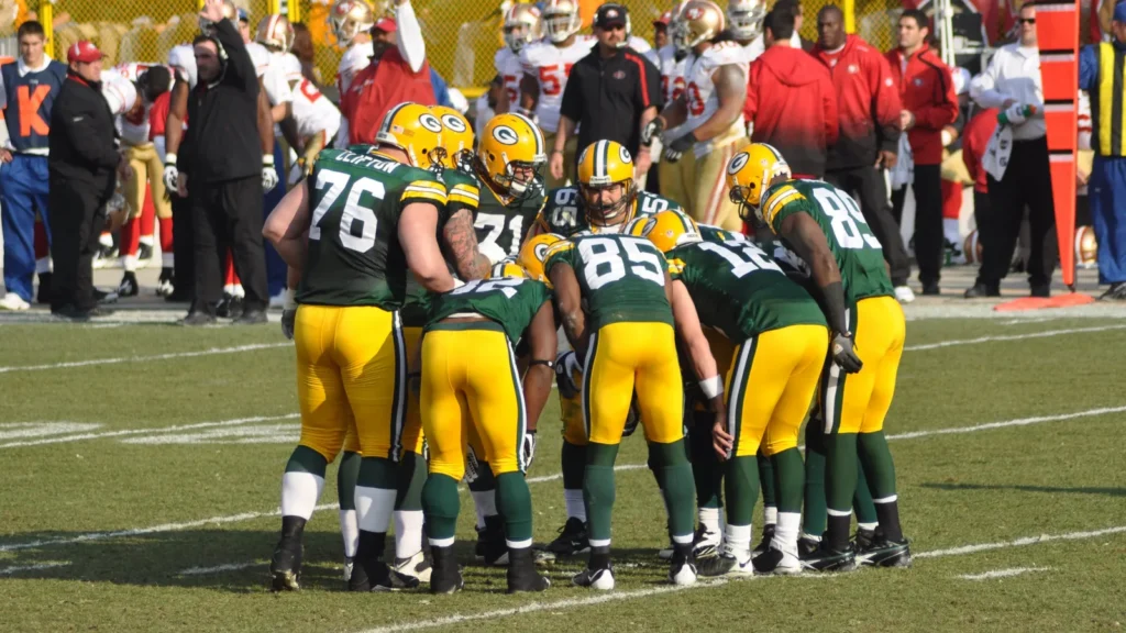 Green Bay Packers Huddling