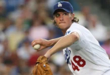 Los Angeles Angels bullpen under pressure amid ongoing struggles this season John Ely picks up a dribbler and throws to first during the game