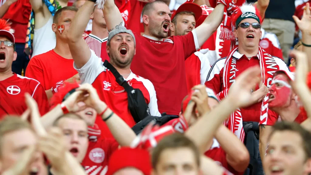 LVIV UKRAINE JUNE 17 2012 Danish football supporters ultras show their support during the UEFA EURO 2012 game Germany v Denmark at Lviv Arena in Lviv