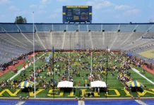 Crowd gathered in the football stadium for Michigan Football Youth Day.