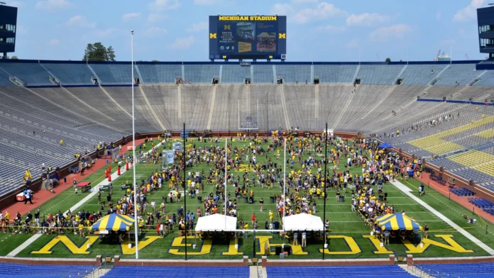 Crowd gathered in the football stadium for Michigan Football Youth Day.
