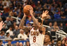 Late-game error acknowledged by NBA in closing moments of Cavaliers vs Hawks matchup Cleveland Cavaliers' player aiming for the net during the game.