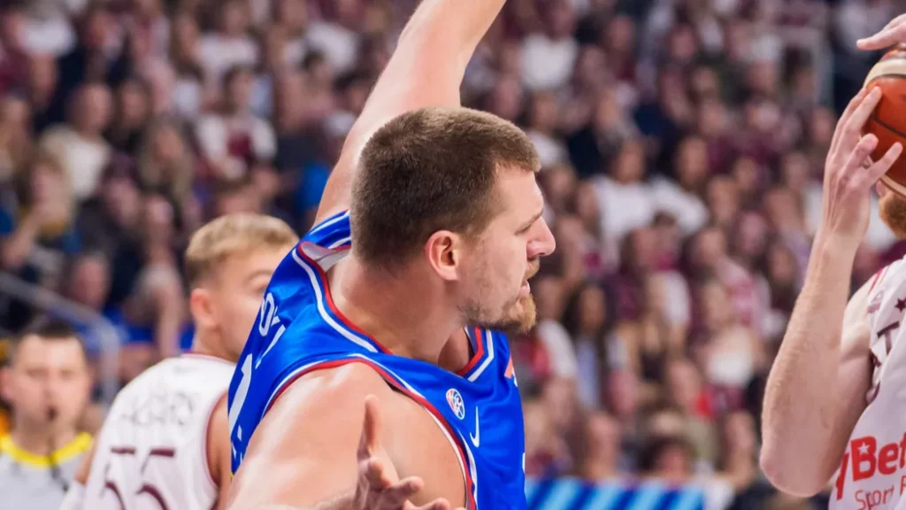 RIGA LATVIA 30th August 2025 Nikola Jokic L and Davis Bertans R during FIBA EUROBASKET 2025 basketball match between National mens team Latvia and National mens team Serbia
