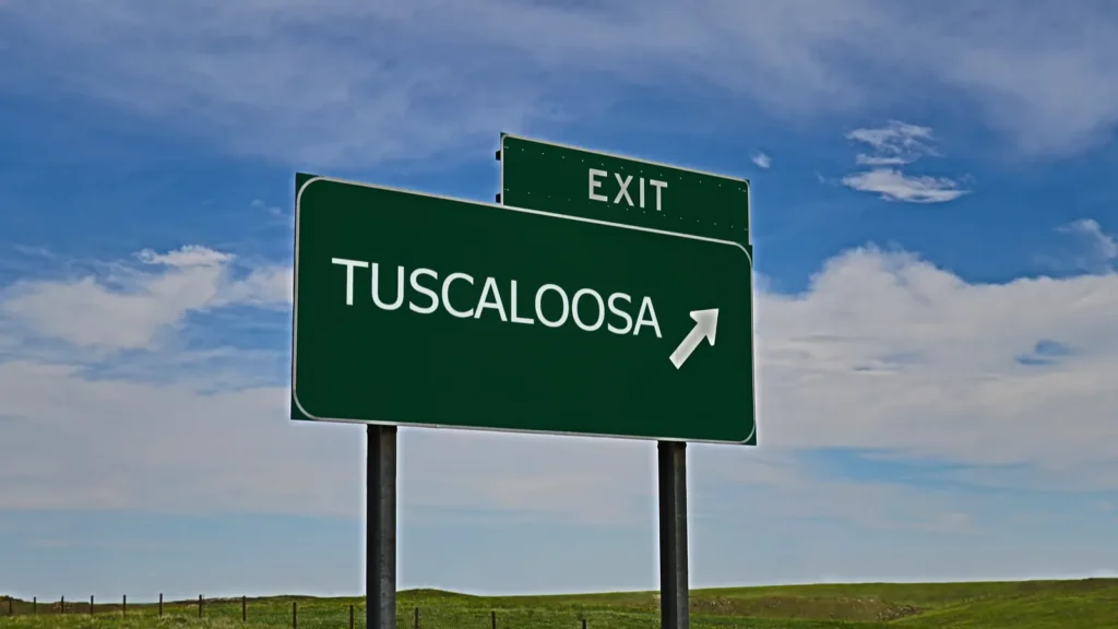 Road sign the direction way to TUSCALOOSA