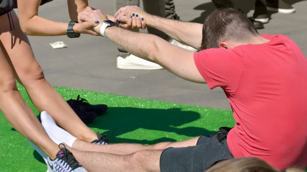 SaintPetersburgRussia may202018Young girls perform warmup massage for athletesMuscles relaxFatigue leaves the bodyPower and vigor are back