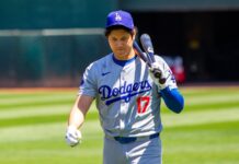 Shohei Ohtani earns first-of-its-kind honor in MLB career Shohei Ohtani walks on the field during a match.