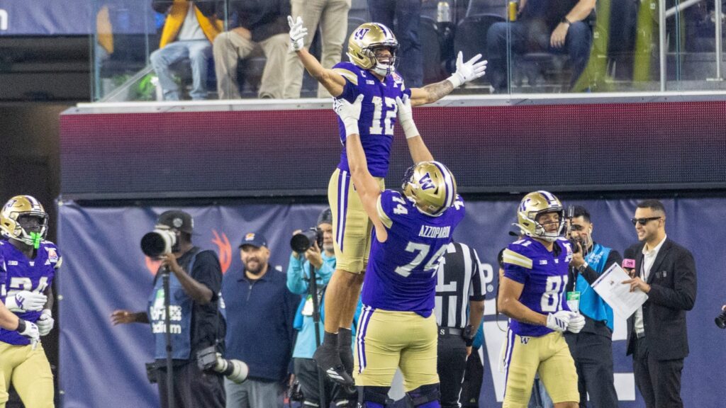 wide receiver Denzel Boston celebrates after scoring a touchdown against Boise State