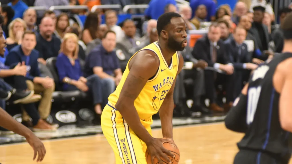 Draymond Green playing basketball.