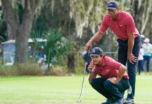 Charlie Woods misses a big career chance after a fan’s phone mistake Charlie Woods and Tiger Woods line up a putt together on a green during the PNC Championship