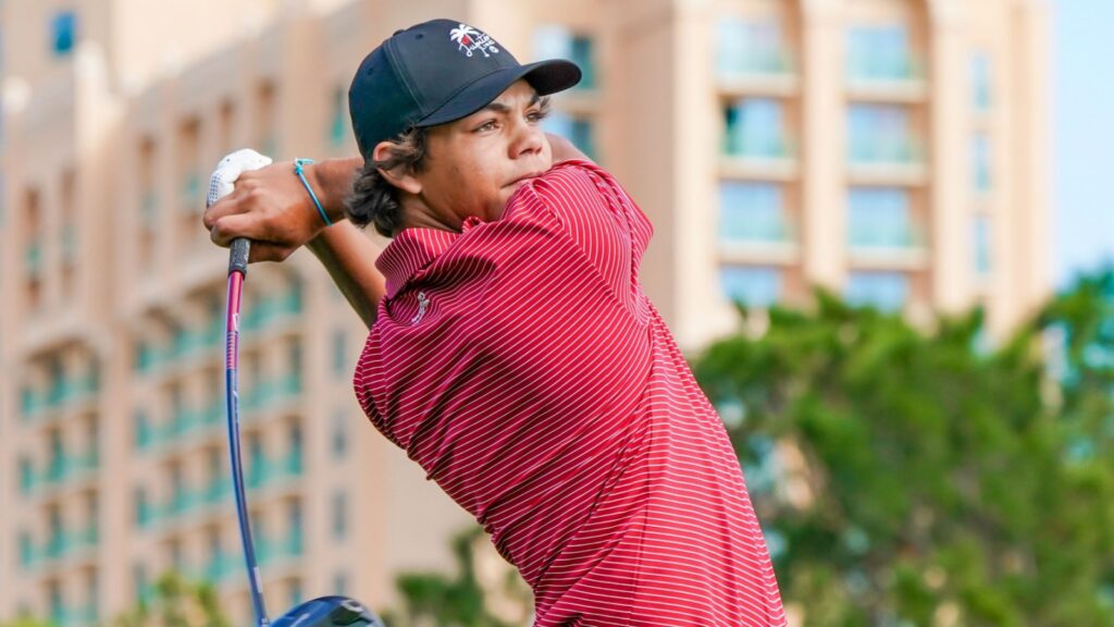 Charlie Woods in action during a golf game.