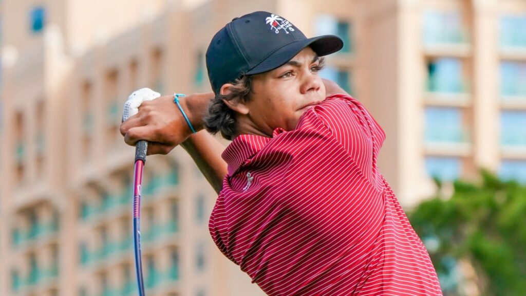 Charlie Woods in action during golf game.