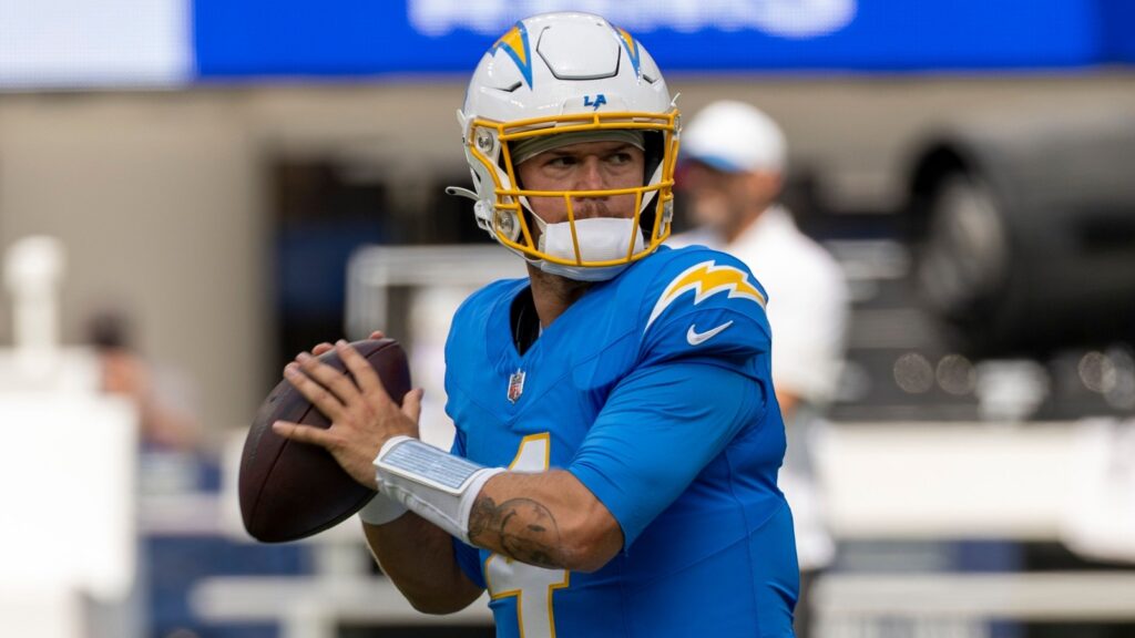 Taylor Heinicke in action during an NFL game.