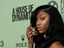 Angel Reese posing for the camera at an event.