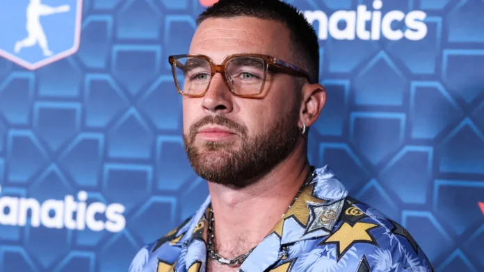 American football tight end Travis Kelce arrives at The Players Party.