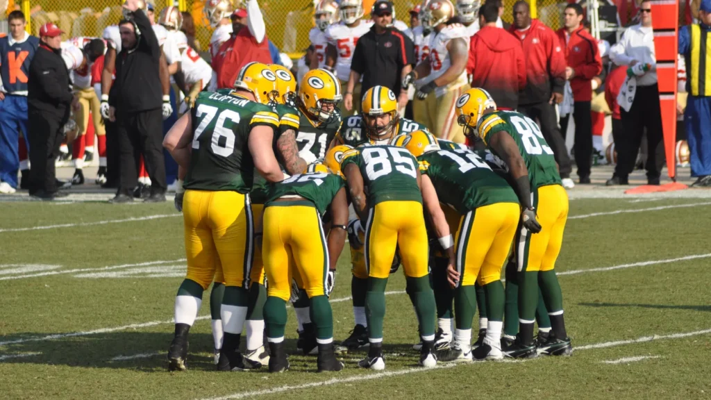 Green Bay Packers Huddling