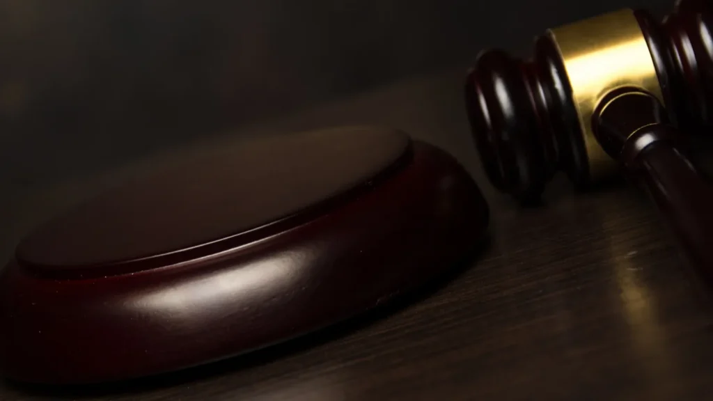 Judge gavel on wooden background