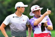 Breaking down PGA Tour caddie pay Whee Kim, of South Korea, and his caddie are pictured during the 1st round of CIMB CLASSIC 2018 at TPC KUALA LUMPUR.