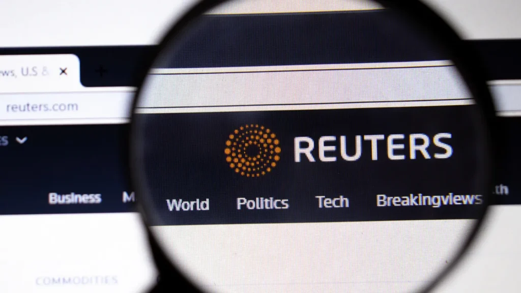 Reuters website page in browser on laptop screen