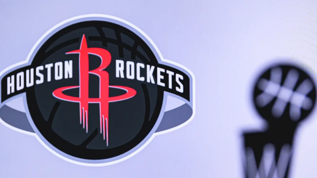 Houston Rockets Basketball club on the white screen Silhouette of NBA trophy in foreground