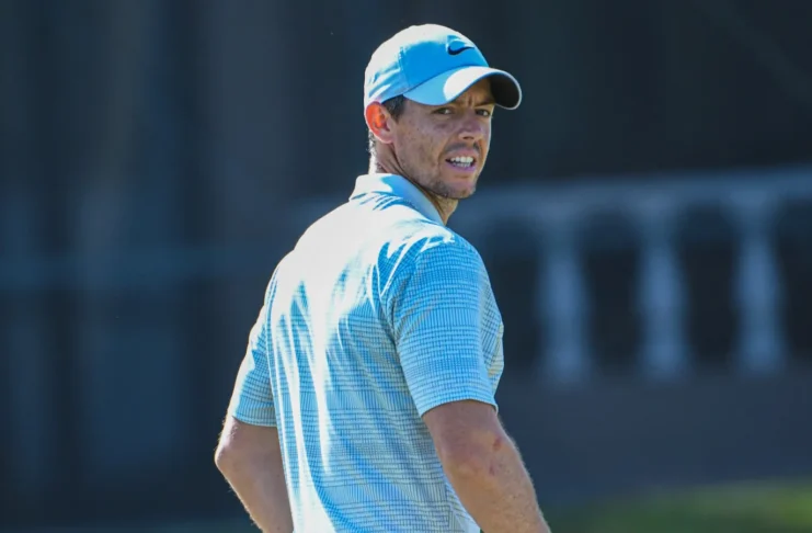 Rory McIlroy looks on during a golf match