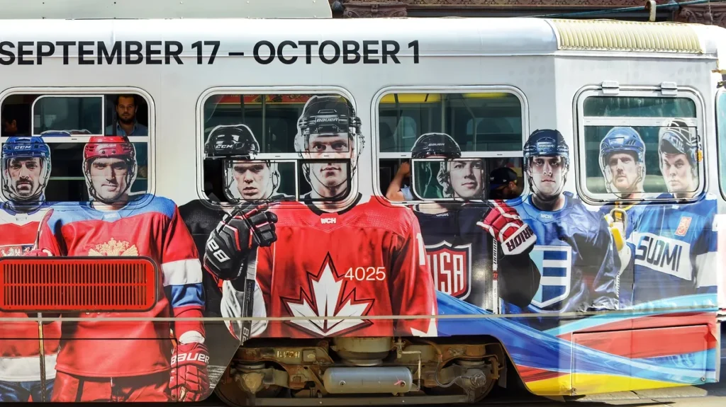 A public transit bus decorated with a large advertisement featuring various national ice hockey players and their jerseys