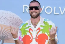 Travis Kelce arrives at the REVOLVE Festival 2023