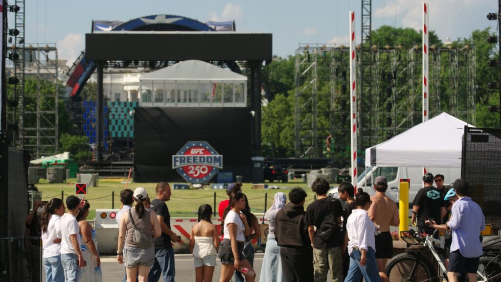 The UFC Freedom 250 stage setup near the Ellipse, with the White House visible in the background.