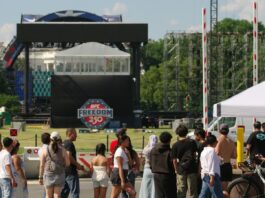 The UFC Freedom 250 stage setup near the Ellipse, with the White House visible in the background.