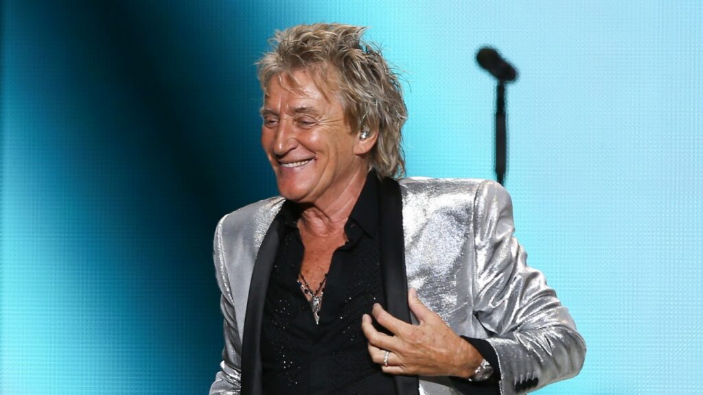 Singer Rod Stewart performing at the concert.