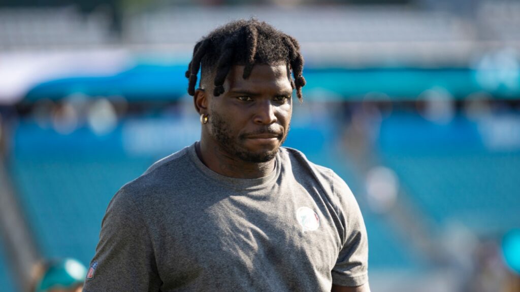 NFL player Tyreek Hill on the field.