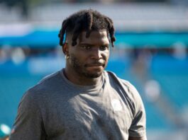 Tyreek Hill faces fresh NFL uncertainty after $500K legal ruling NFL player Tyreek Hill on the field.