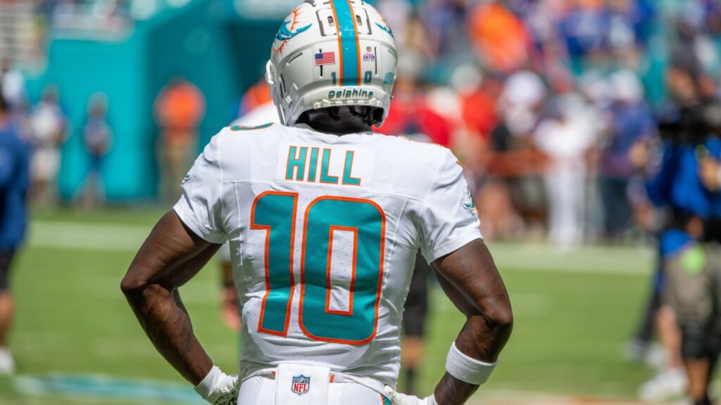 Back view of Tyreek Hill in Miami Dolphins jersey.