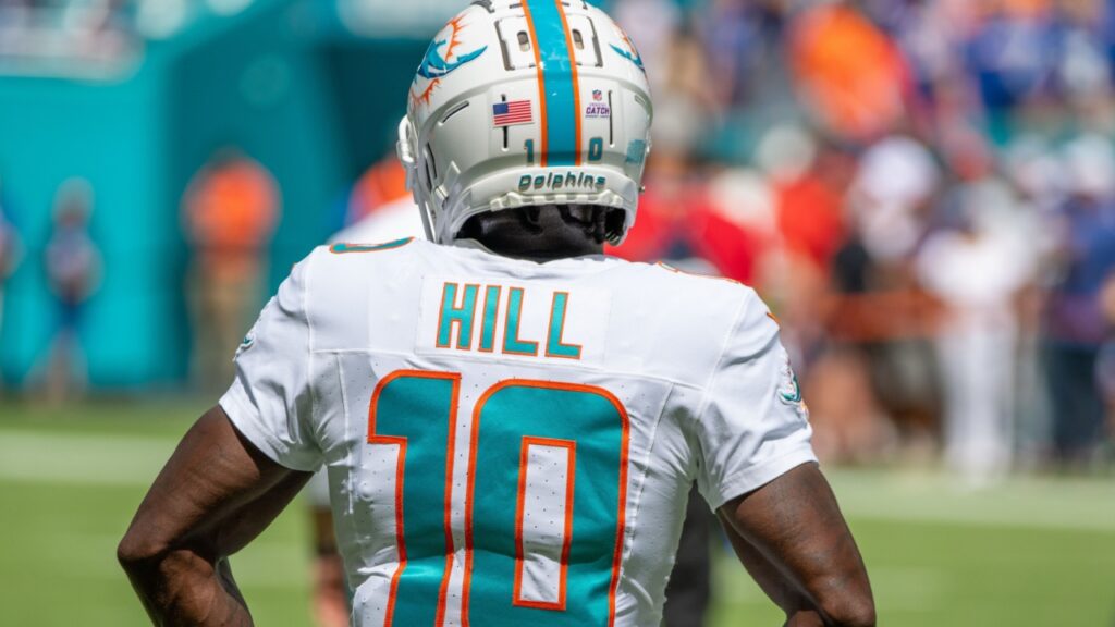 Back view of Tyreek Hill in Miami Dolphins jersey.