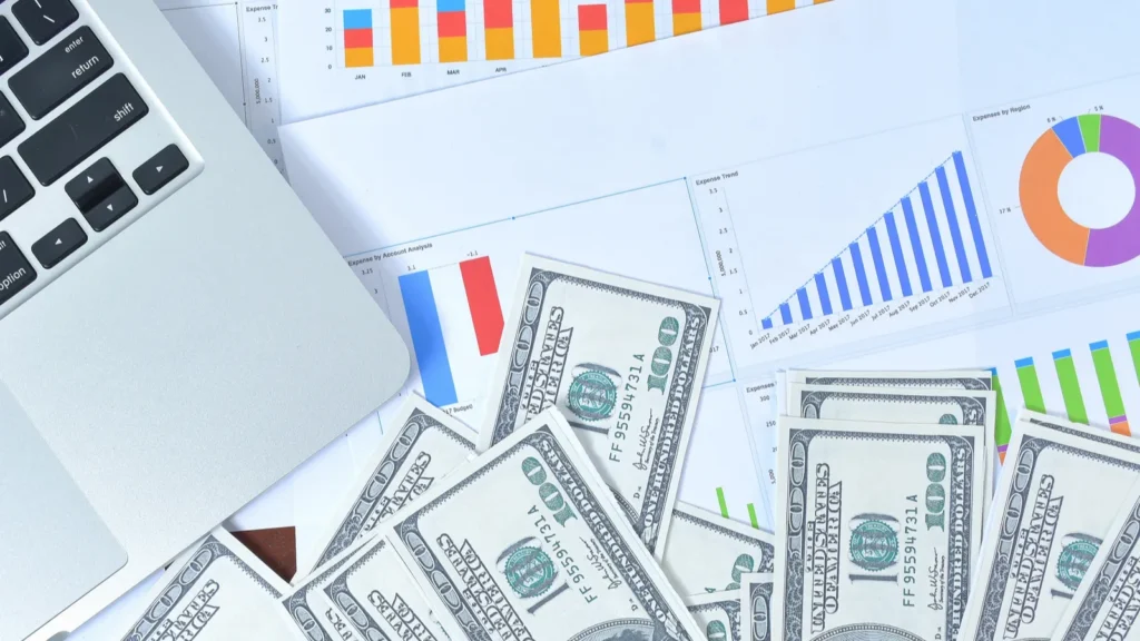 business concept laptop graph and banknote dollars with notebook and