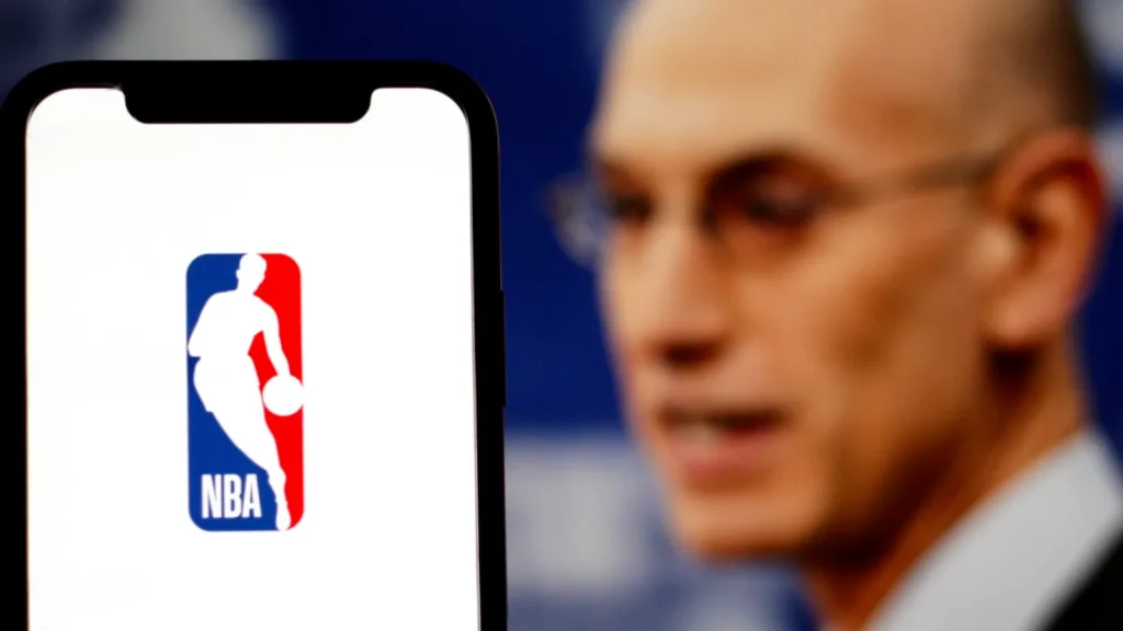 Illustration of the NBA logo with the picture of Adam Silver behind it