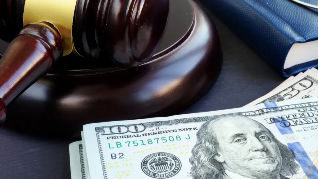Gavel and dollar banknotes