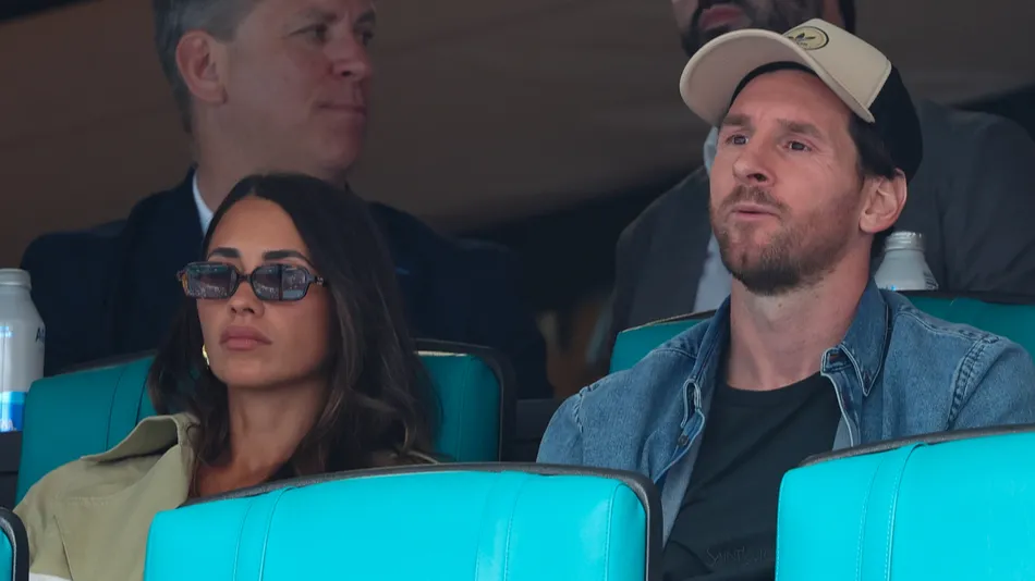 Lionel Messi and Antonela Roccuzzo attending a tennis match