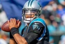A fiery response from Cam Newton slams a professional fighter’s controversial Michelle Obama statement Cam Newton throws a pass