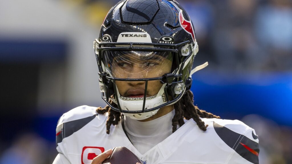 C.J. Stroud #7 warms up before an NFL football game
