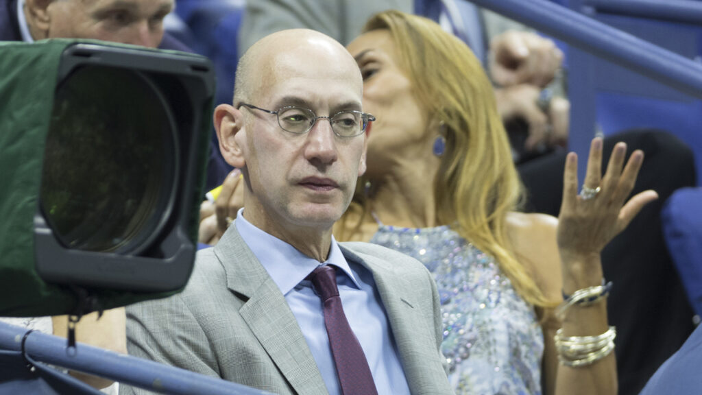Adam Silver attends a basketball match