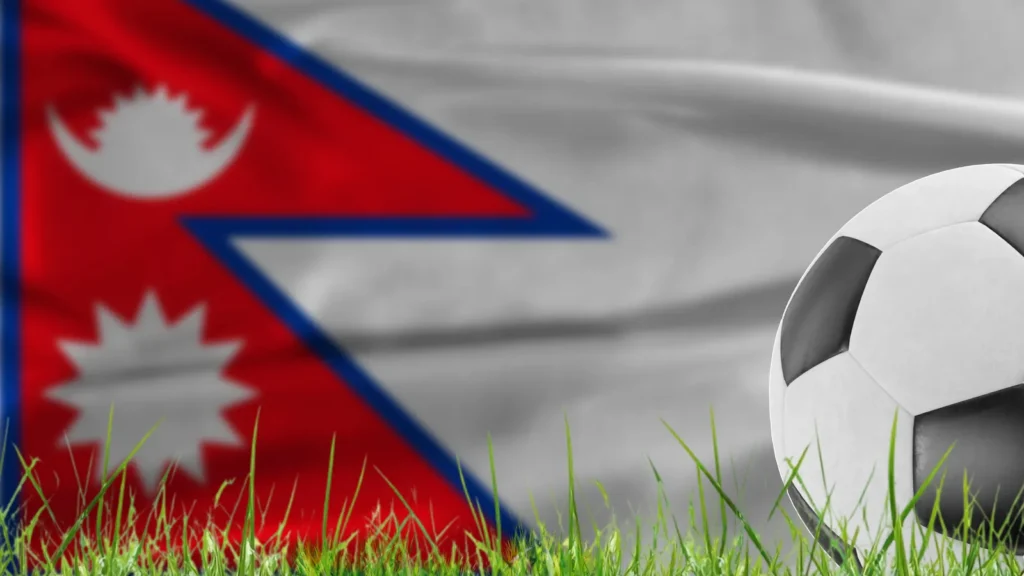 Soccer ball on pitch against Nepal flag background