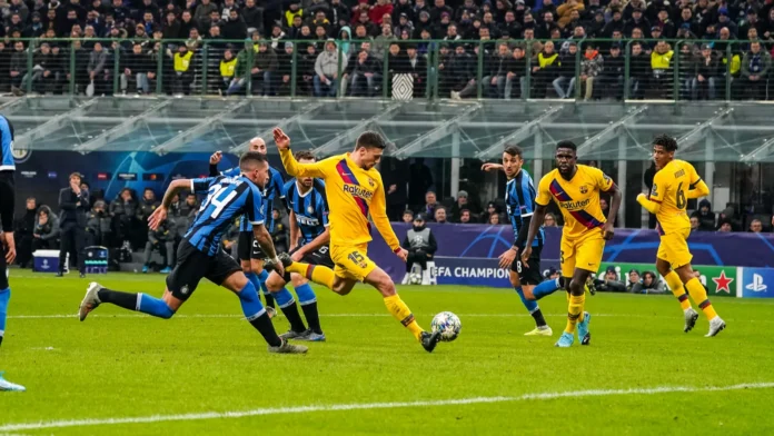 Soccer match being played between two teams.