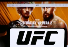 White House addresses controversial remark about Michelle Obama following UFC event Close-up of UFC logo on cellphone.
